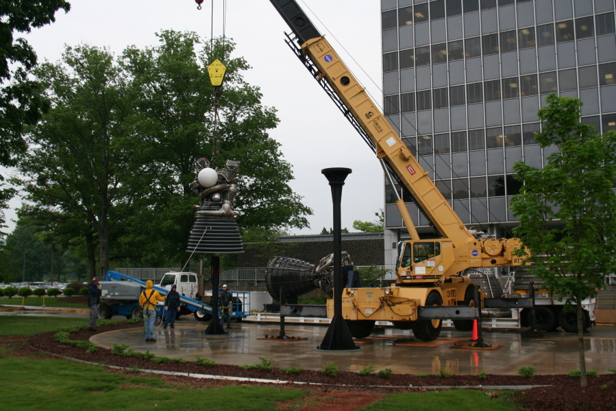 Placing J-2 rocket engine on throat support during Installation of Building 4200 Engines (May 13, 2008) at Marshall Space Flight Center Engine Displays