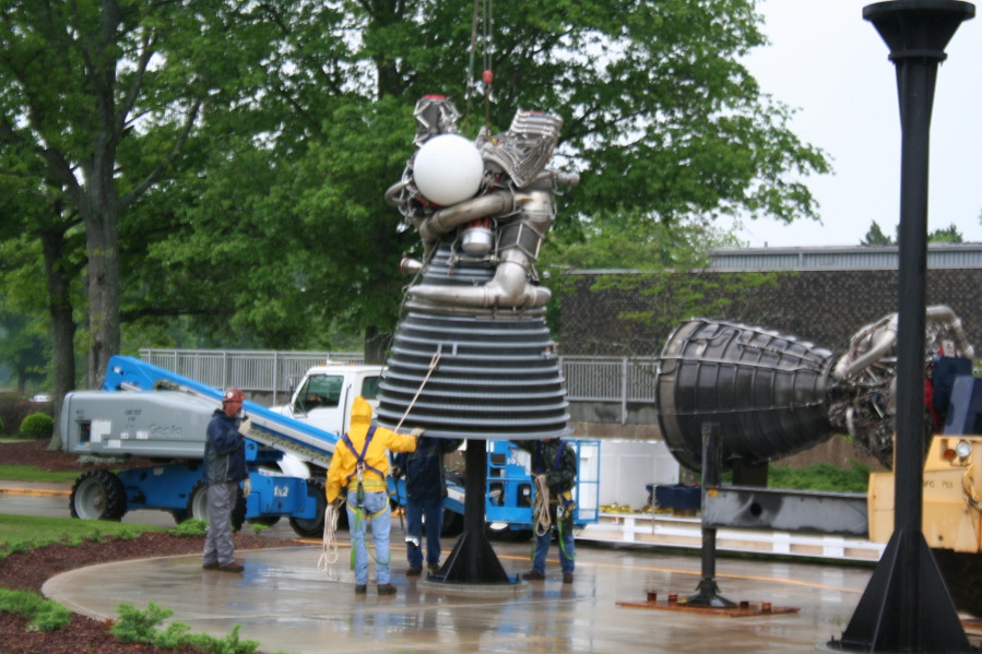 Placing J-2 rocket engine on throat support during Installation of Building 4200 Engines (May 13, 2008) at Marshall Space Flight Center Engine Displays