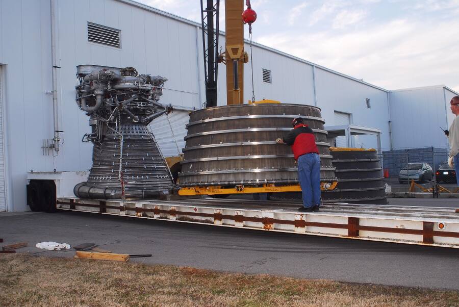 Loading the F-1 rocket engine thrust chamber and nozzle extension onto a flatbed truck during F-5036 Fit Test (March 6, 2008) at Marshall Space Flight Center Engine Displays