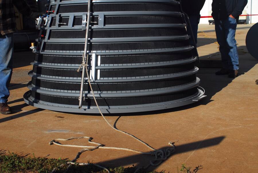 J-2 rocket engine resting on its throat support during Building 4200 J-2 Engine Fit Test (March 24, 2008) at Marshall Space Flight Center Engine Displays
