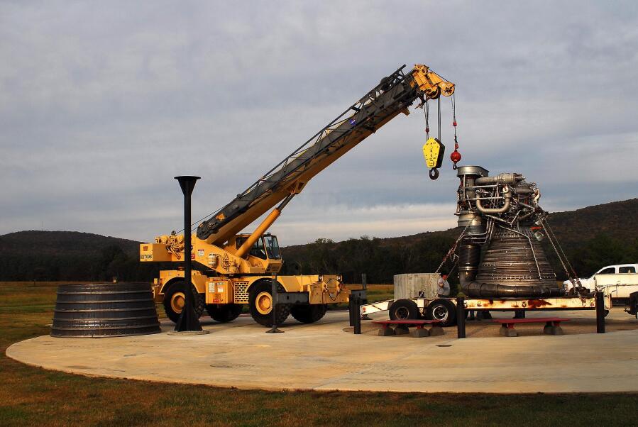 Positioning the F-1 rocket engine thrust chamber by the crane during F-4023 Installation at Building 4205 (October 21, 2009) at Marshall Space Flight Center Engine Displays