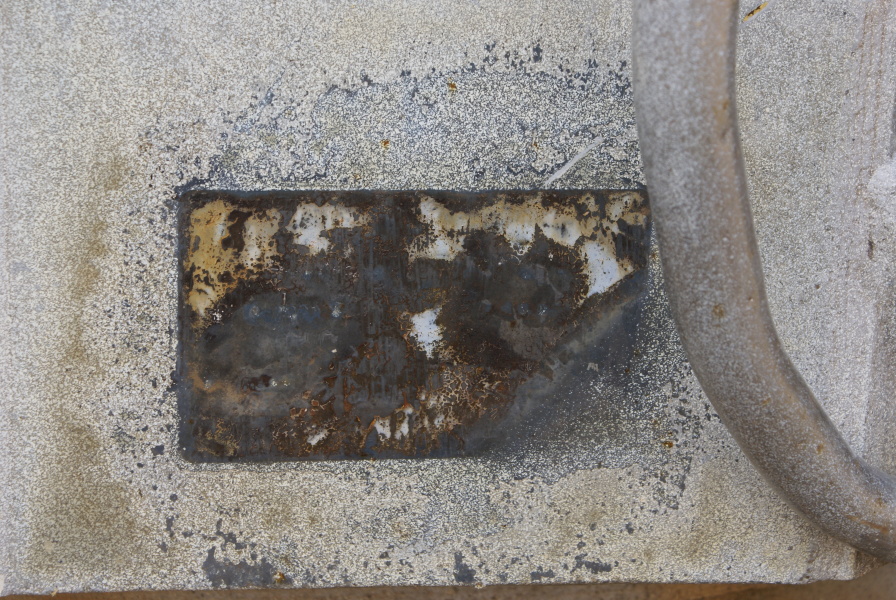 Corroded ID plate on F-1 Engine Turbopump from Cold Calibration at Marshall Space Flight Center