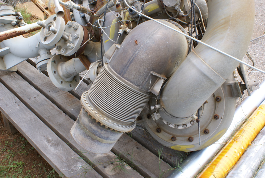 Turbine and exhaust hood on H-1 Engine Turbopump from Cold Calibration (Post Demolition) at Marshall Space Flight Center.