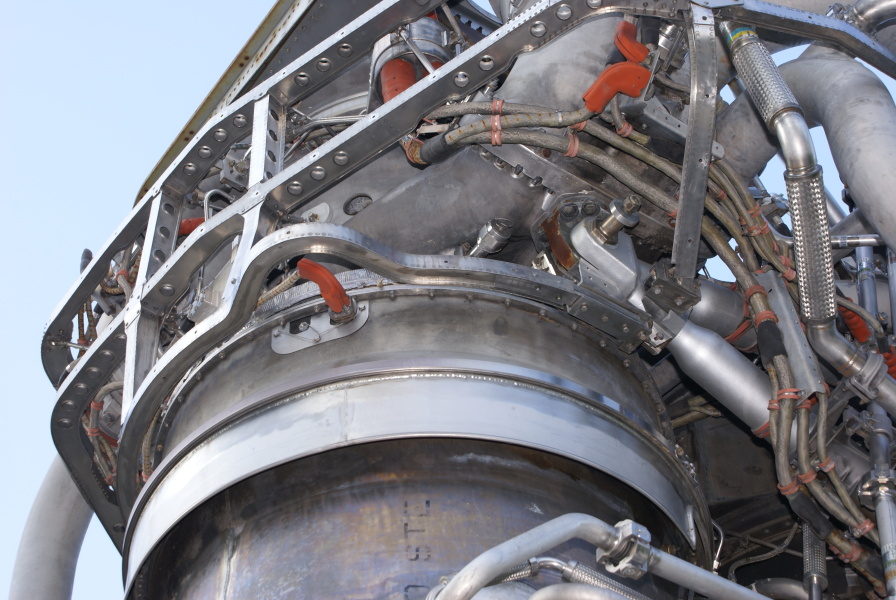 thermal insulation brackets around the turbine manifold on F-1 Engine (Building 4200) at Marshall Space Flight Center
