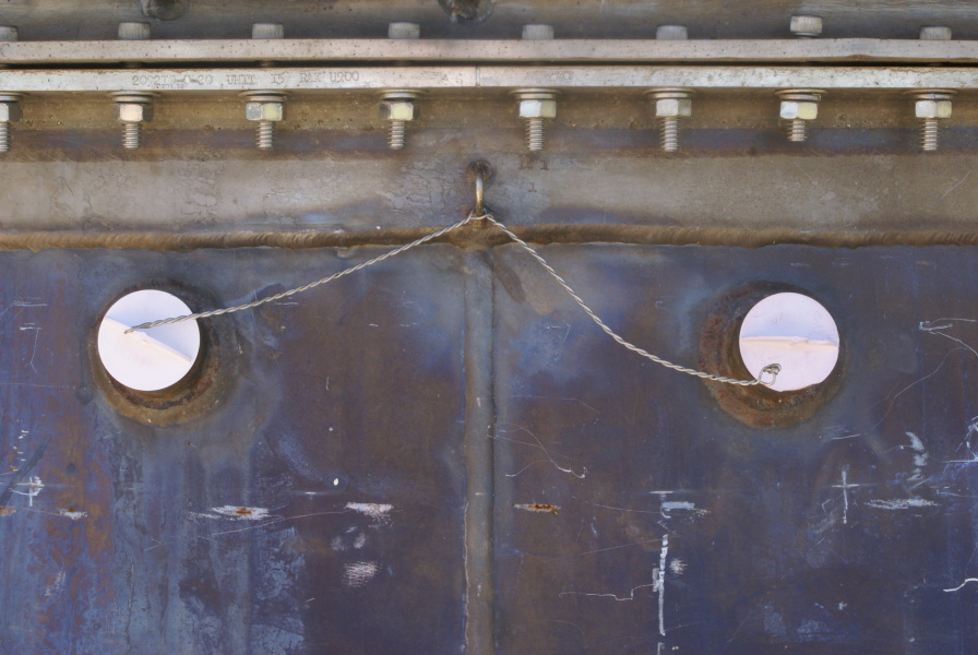 F-1 Engine F-4023 nozzle extension pyrotechnic igniter bosses and closures at Marshall Space Flight Center