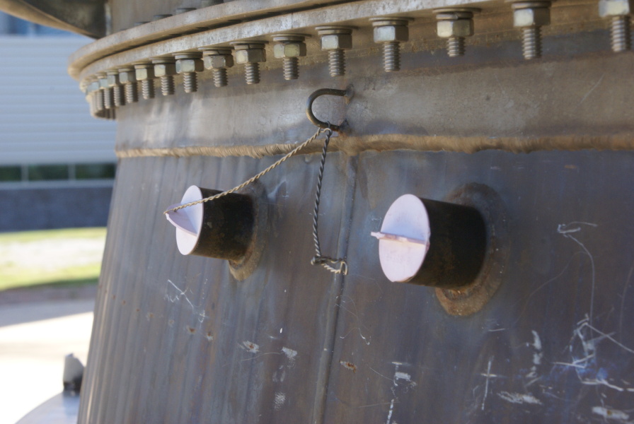 F-1 Engine F-4023 nozzle extension pyrotechnic igniter bosses and closures at Marshall Space Flight Center