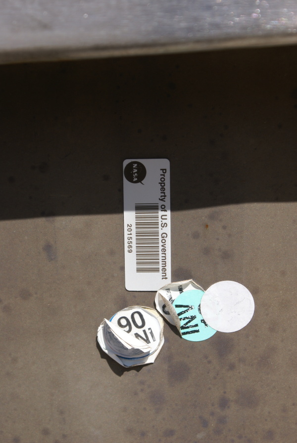 U.S. Government property tag on F-1 Engine (Building 4200) nozzle extension at Marshall Space Flight Center