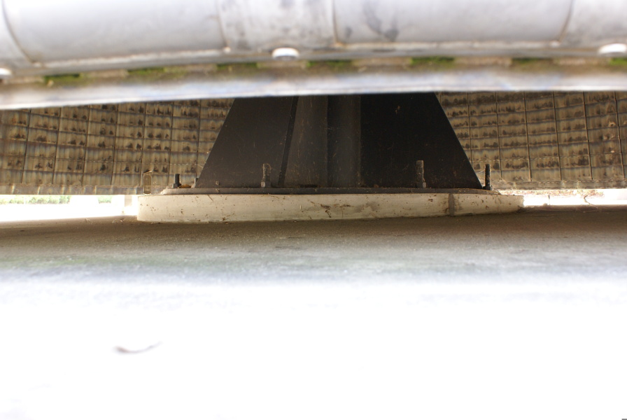 F-1 Engine (Building 4200) throat support, visible under the engine's nozzle extension, at Marshall Space Flight Center