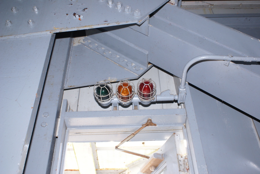 Caution and warning lights above door in interior of S-IC Test Stand at Marshall Space Flight Center