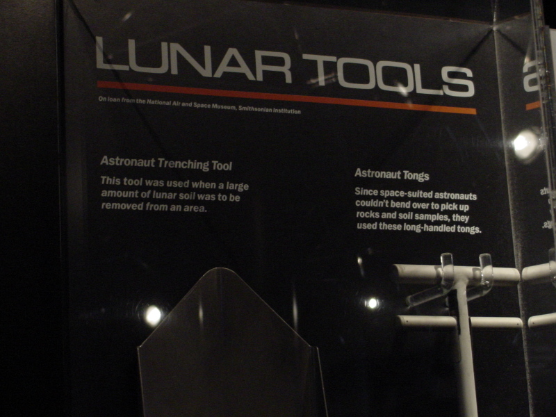Sign accompanying the astronaut trenching tool and astronaut tongs at Museum of Science & Industry