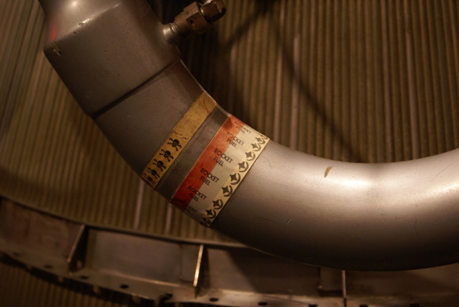 Labels on the fuel line of the RL-10 Engine at the Museum of Science & Industry