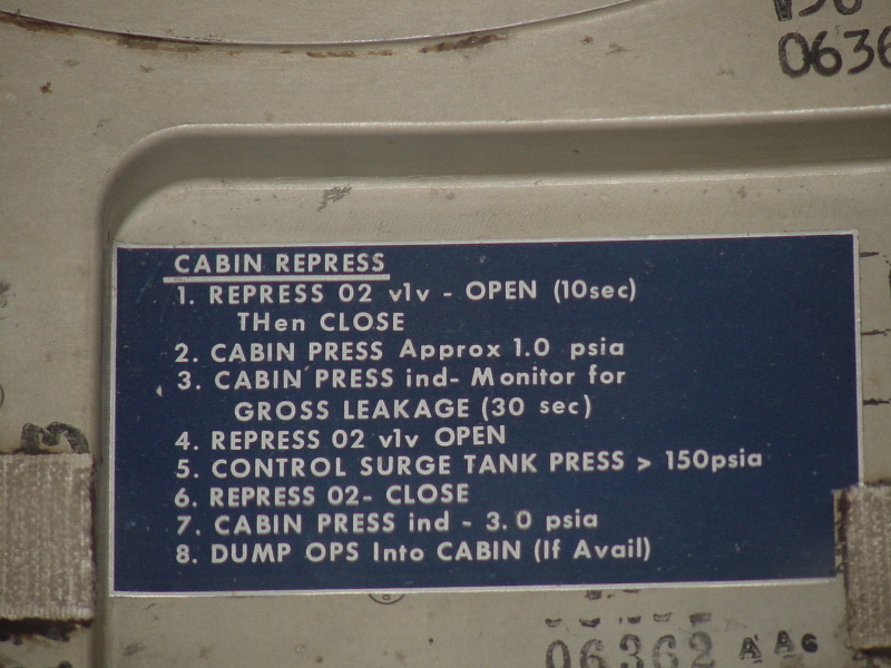 Cabin repressurization instruction label on Apollo 10 Hatch at Michigan Space and Science Center