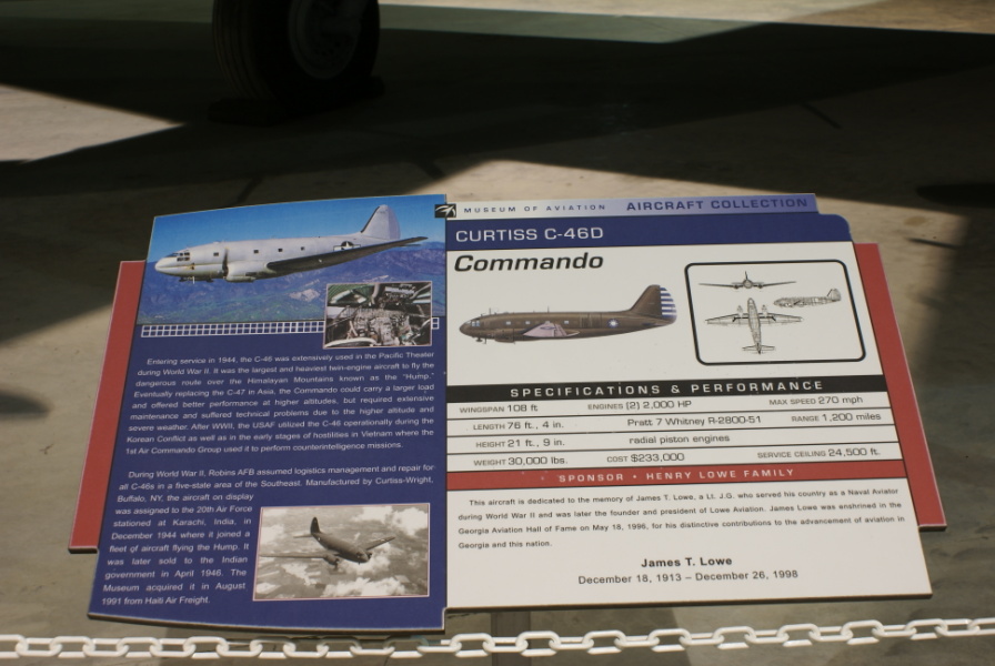 Sign by the C-46 at the Museum of Aviation