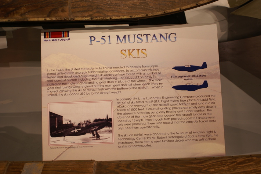The sign by the P-51 ski display.