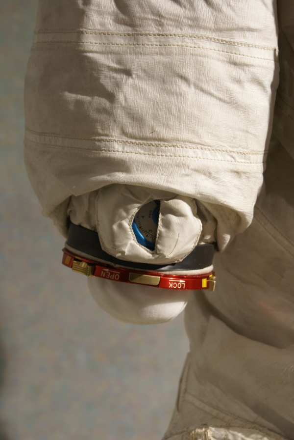 End of Armstrong's Apollo 11 Backup Suit right arm, including pressure gauge and wrist ring at Neil Armstrong Air & Space