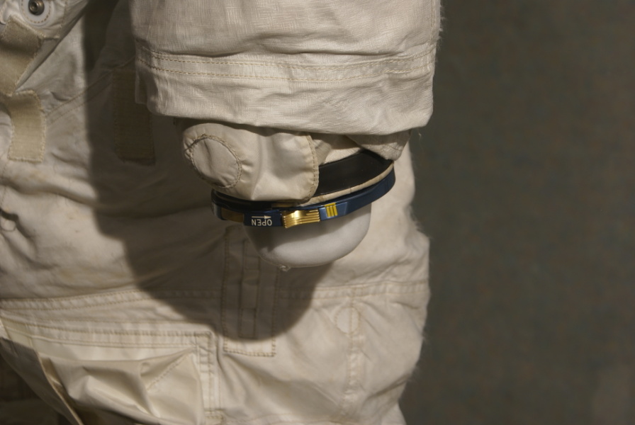 Armstrong's Apollo 11 Backup Suit pressure relief valve on left suit arm near wrist ring at Neil Armstrong Air & Space
