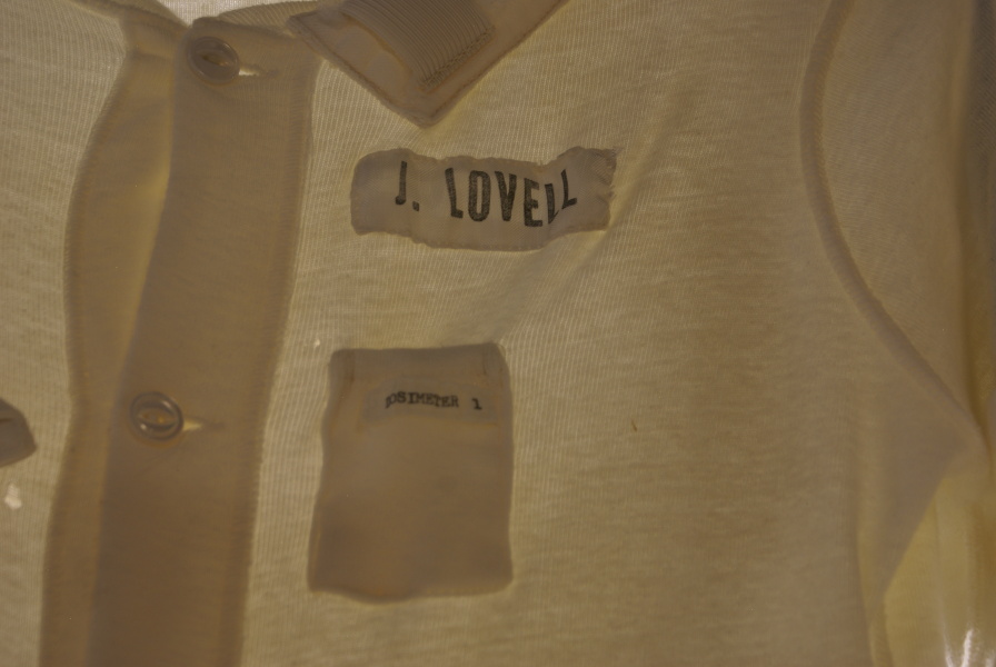 J. Lovell name tag and dosimeter 1 pocket on Lovell's Constant Wear Garment at Neil Armstrong Air & Space
