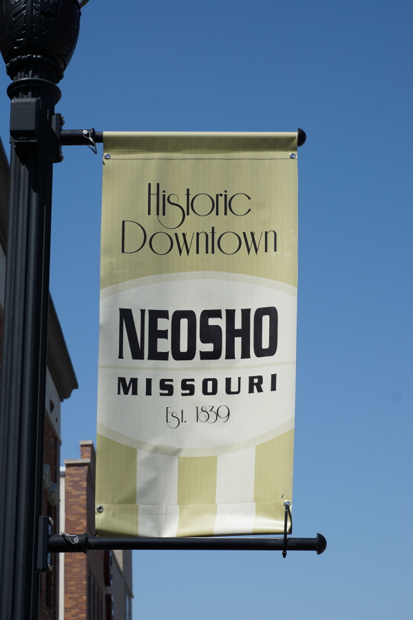 Historic Downtown Neosho Missouri sign in Neosho, Missouri town square