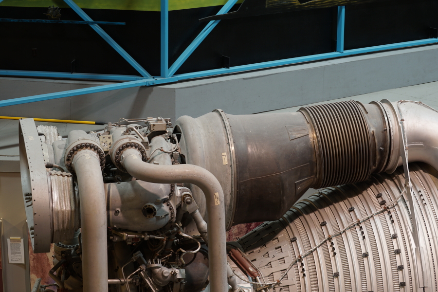 Interface panel, turbopump propellant LOX fuel RP-1 high-pressure ducts, turbine manifold assembly, and heat exchanger on F-1 Engine at Science Museum Oklahoma