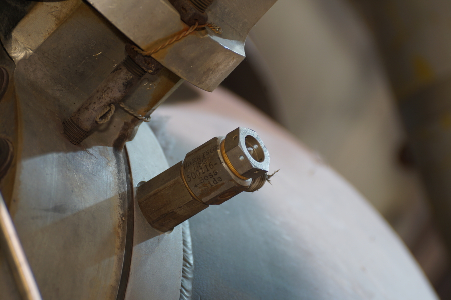 Bolt and insert on gas generator injector on F-1 Engine at Science Museum Oklahoma