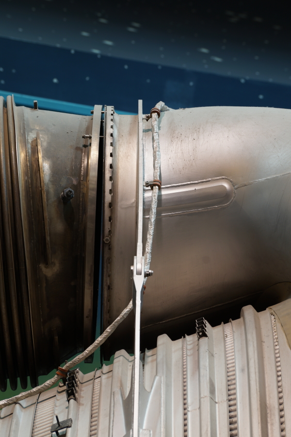 Interface between heat exchanger and turbine exhaust manifold inlet on F-1 Engine at Science Museum Oklahoma