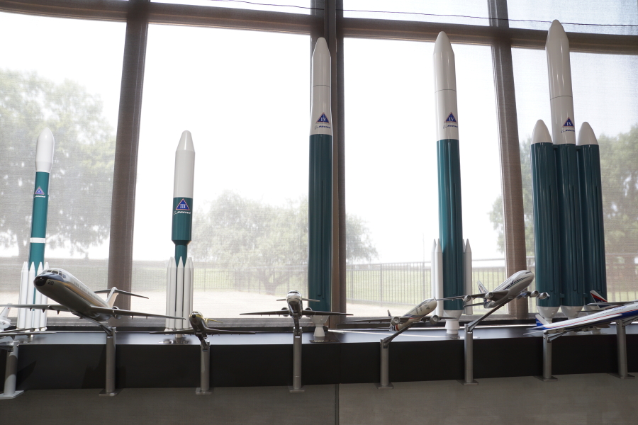 Overall view of the Delta rocket model display.  For whatever reason, the Delta II model at far left has a spotlight on it.