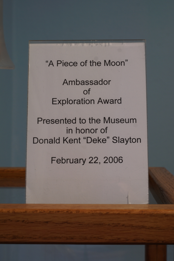 Sign accompanying the Ambassador of Exploration at the Deke Slayton Memorial Space and Bike Museum