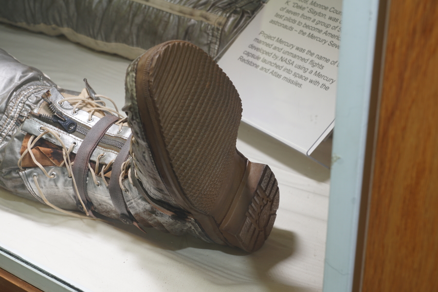 Right boot, including bottom of sole, of Slayton's Mercury Suit at Deke Slayton Memorial Space and Bike Museum