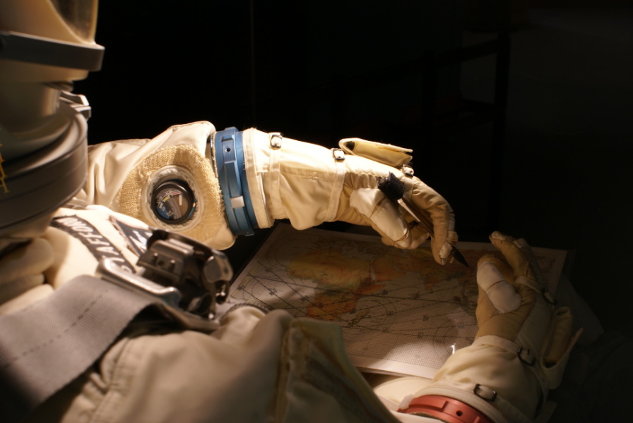 G4C suit gloves on astronaut in Gemini Ejection Seat at Stafford Air & Space Museum