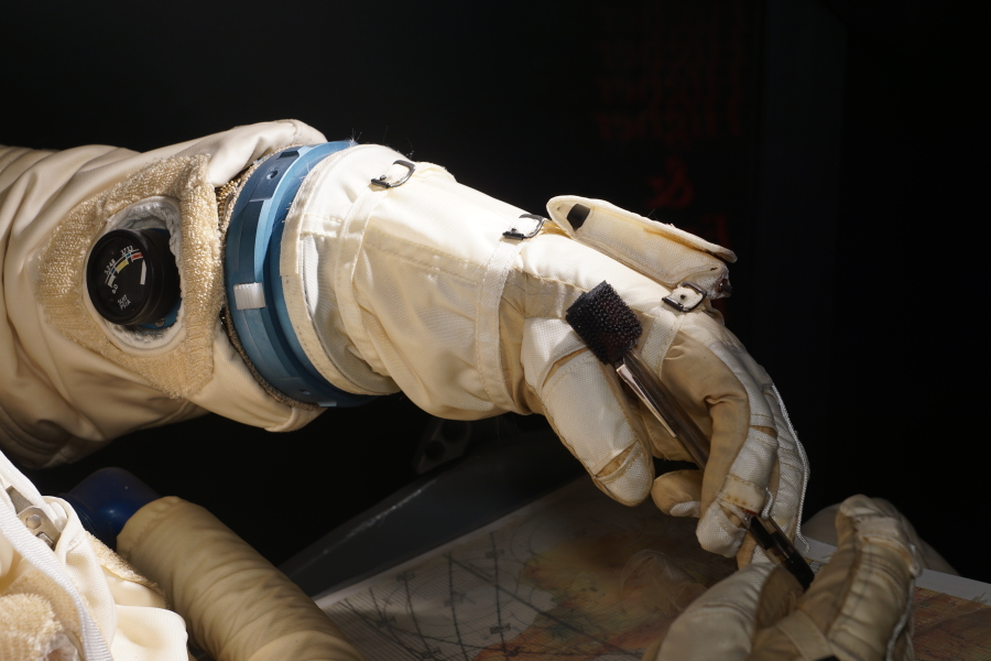 G4C suit gloves on astronaut in Gemini Ejection Seat at Stafford Air & Space Museum
