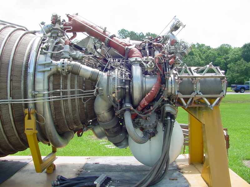 Forward end of J-2 Engine, including fuel liquid hydrogen turbopump, fuel manifold,  and exhaust manifold, at Stennis Space Center