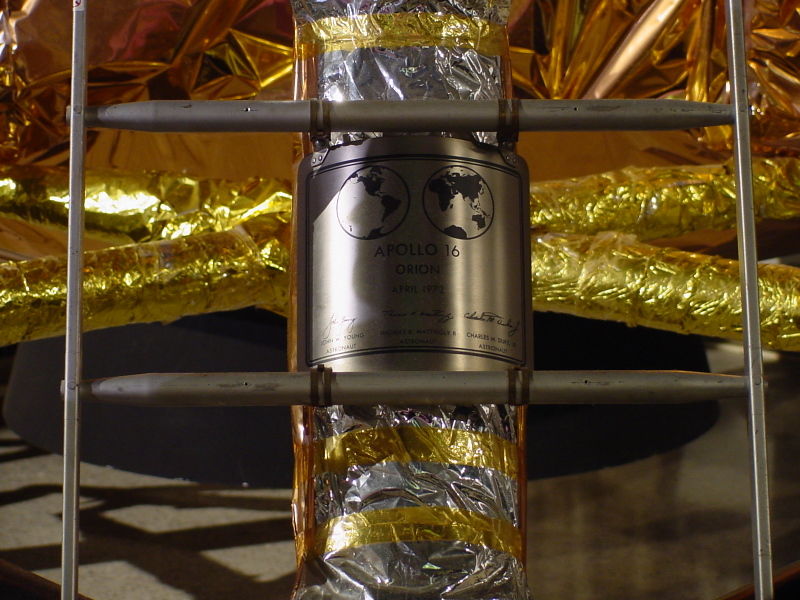 Apollo 16 lunar landing plaque affixed to Lunar Module (Space Hall) landing gear strut with crew access ladder at U.S. Space & Rocket Center