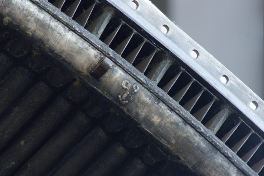 Flow vanes and No. 60 tube marking on fuel return manifold on F-1 Engine (Davidson Center) at U.S. Space and Rocket Center