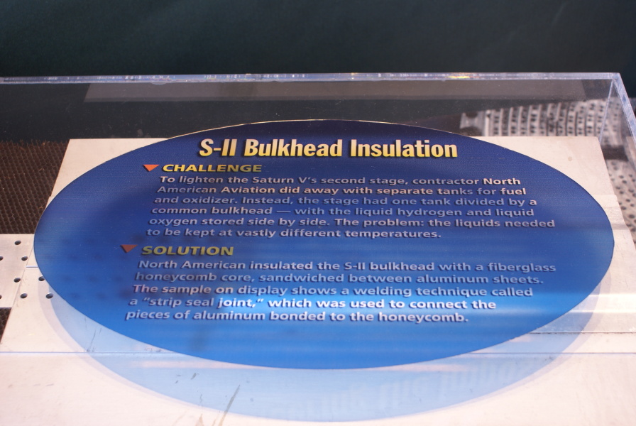 Sign by the S-II Common Bulkhead Insulation at the U.S. Space and Rocket Center.