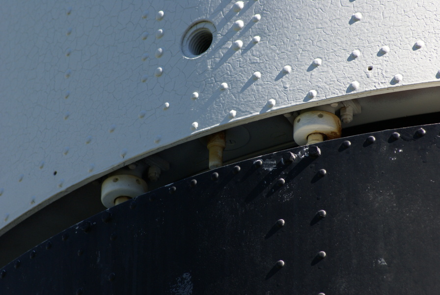 Connecting brackets and engine mount pad at center unit/tail unit interface on Mercury-Redstone Booster at U.S. Space and Rocket Center