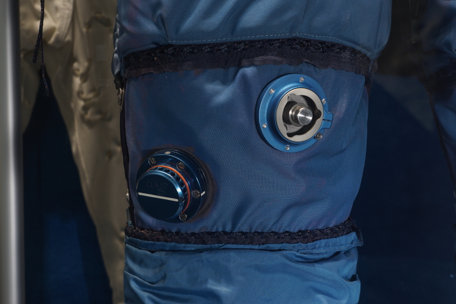 Pressure relief valve and Urine Collection and Transfer Assembly (UCTA) connector on the right thigh of the Apollo A7LB PGA at U.S. Space & Rocket Center